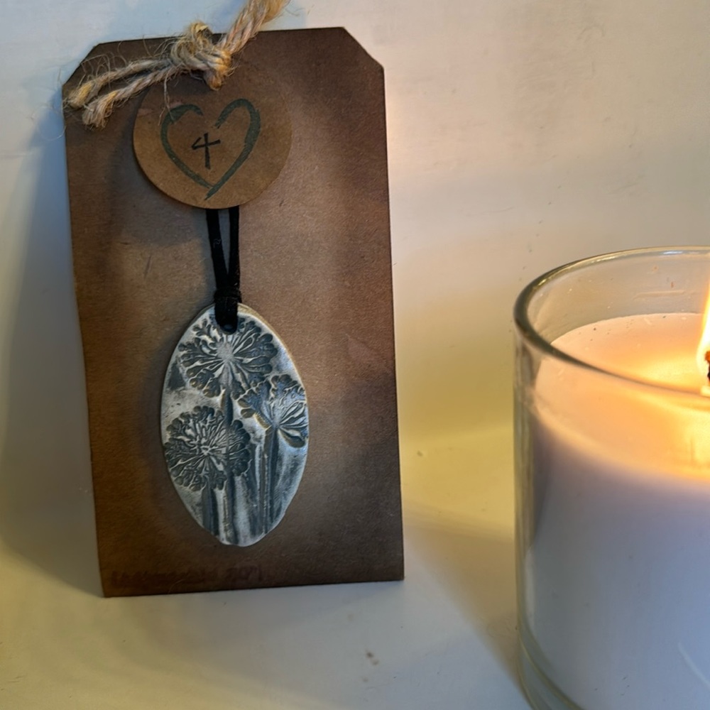 Dandelion pendant with black cord necklace